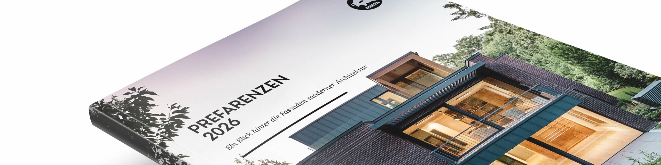 Zdjęcie Księgi PREFARENZEN z wydania z 2026 roku na białym tle. Na okładce widnieje zdjęcie Domu PREFARENZEN.