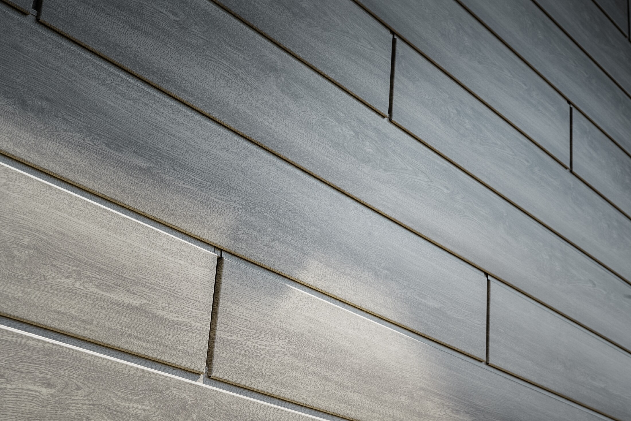 Detailansicht der PREFA Siding Fassade in Eige Beige Grau mit Fugen