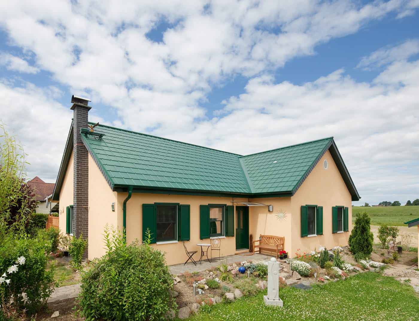 Obiekty referencyjne PREFA Systemy dachowe Dachówka klasyczna 06 P.10 zieleń mchu